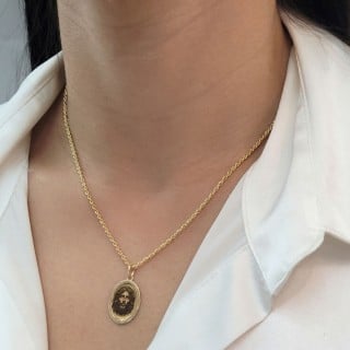 Pingente de ouro 18k face de Cristo detalhada 