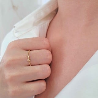 Anel de ouro 18k bolinhas e laço 