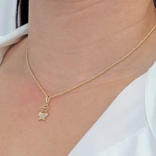 Pingente de ouro menino 18k coração cravejado P