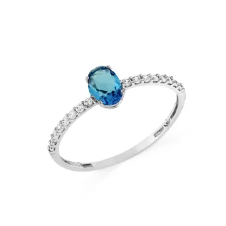 Anel de ouro branco 18k pedra azul claro